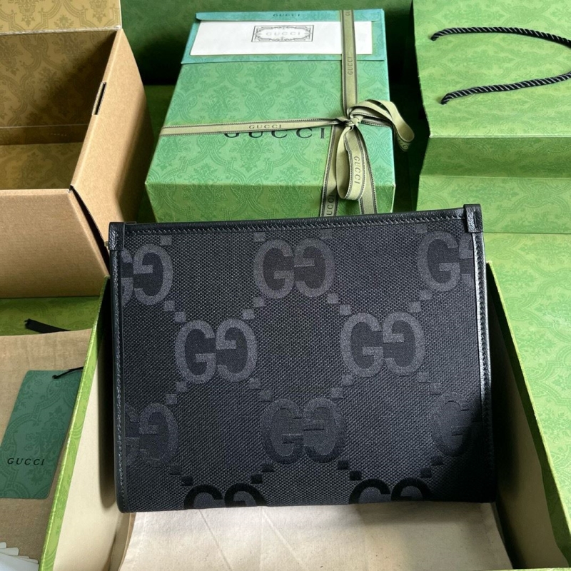 G*u*i clutch bags